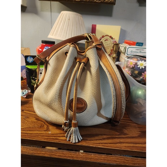 Dooney & Bourke Handbags - Vintage Dooney &‎ Bourke Leather Drawstring Bucket Bag White & Tan Trim 1980s